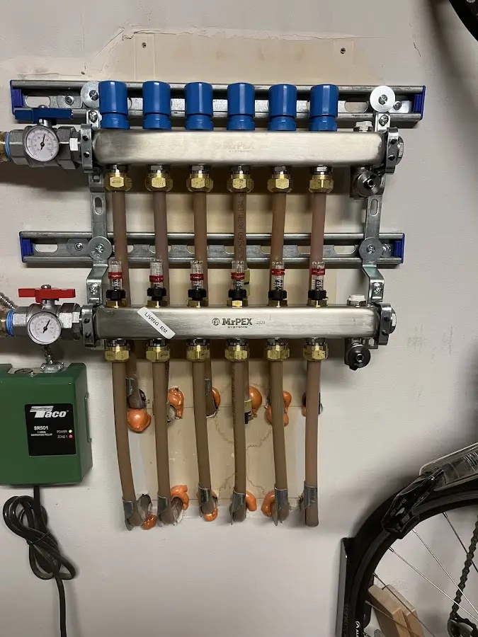 Plumber performing Gas Leak Detection at a residential property in Hopedale